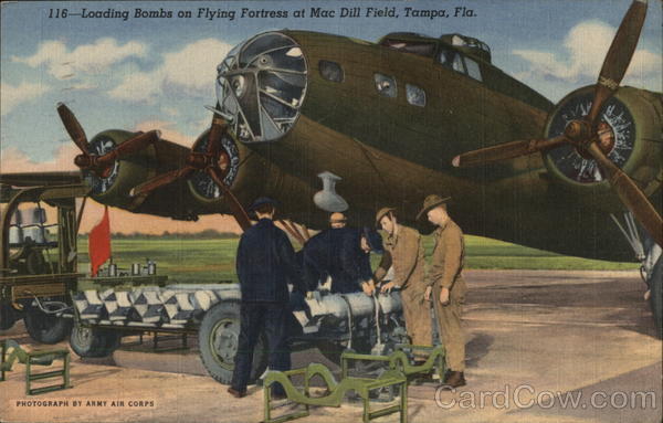 Loading Bombs on Flying Fortress at Mac Dill Field Tampa Florida