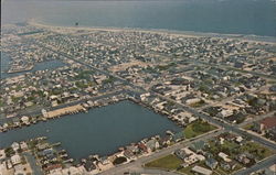 Aerial View, Stone Harbor Looking North, Shelter Haven Basin in Foreground Postcard