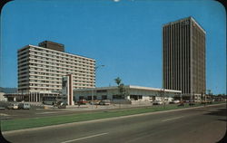 Stone Center Showing Antlers Plaza Hotel and Holly Sugar Building. Postcard