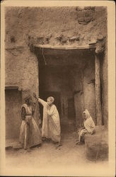 Causerie dans les Ruelles Bou-Saada, Algeria Africa Postcard Postcard