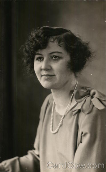 Young Woman with Short Dark Hair and Pearl Strand Benton Harbor