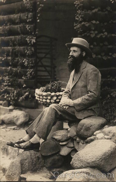 A Man Sitting on Rocks House of David