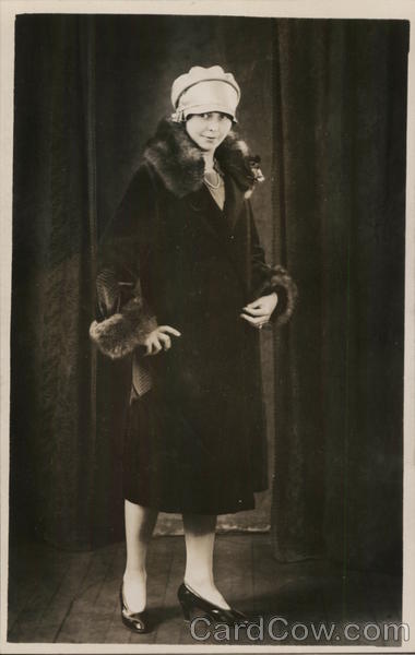 Woman Wearing Coat with Fur Trim House of David