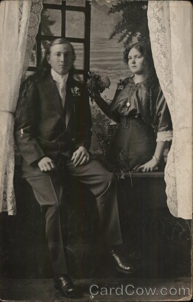 A Man Sitting in a Window with a Woman House of David