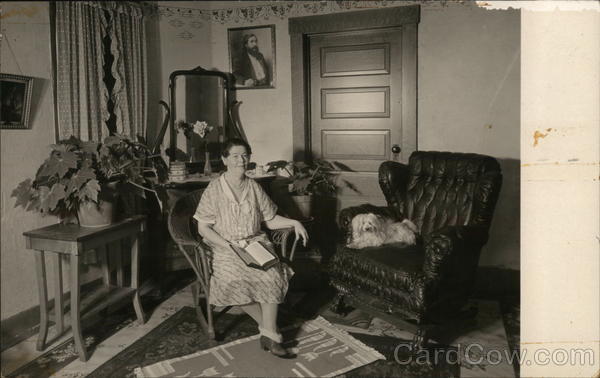 Woman Seated in Chair, Dog in Chair Next to Her Benton Harbor Michigan