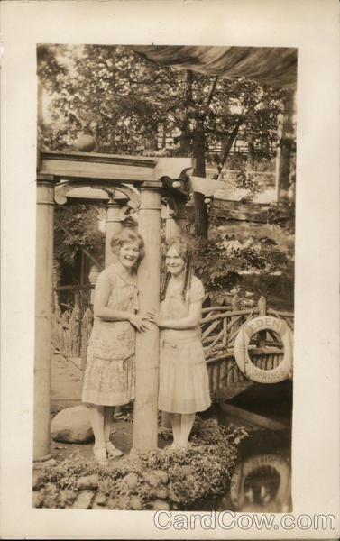 Two Women Posing By a Bridge House of David