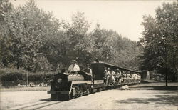 People Riding a Miniature Train Postcard