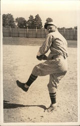 Baseball Player in Uniform Preparing to Throw Ball Postcard