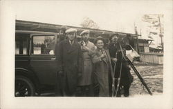 Five Men Standing Next to Car with Camera Tripod Postcard
