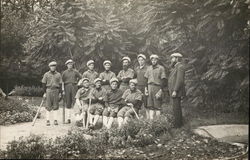 Uniformed Baseball Team, Some Holding Bats Postcard
