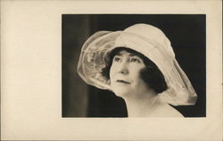 A Woman with a Large Hat Postcard
