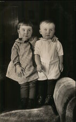Two Little Kids Standing on a Chair Postcard