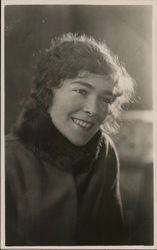 A Woman with Short Dark Hair Postcard