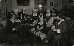 Men, Women Dressed as Pilgrims Seated Around Table Benton Harbor, MI House of David Postcard Postcard Postcard