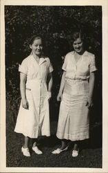 Two young ladies in white Postcard