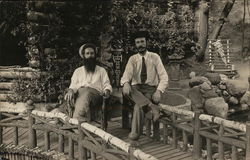 Two Men Seated on Small Bridge Near Eden Springs Pennants Postcard