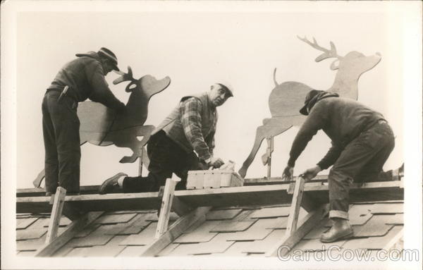 Workers on Roof Setting up Reindeer Decorations Children