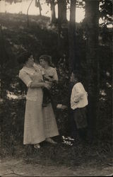 Woman With Two Children Near Trees Paw Paw Lake, MI Postcard Postcard Postcard