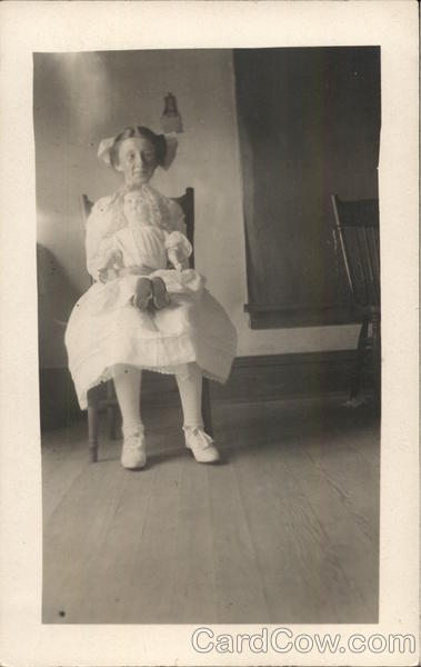 Snapshot of Girl Holding Doll Dolls