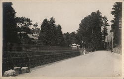 Man Walking Along Street Postcard