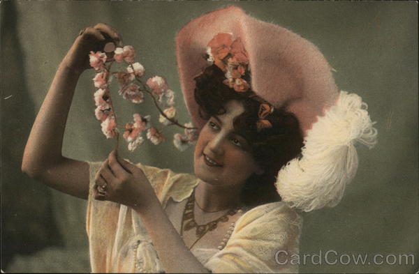 Woman Holding Strand of Pink Flowers, Hat with Large Plume