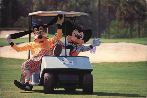 Mickey Mouse and Goofy in a Golf Cart Disney