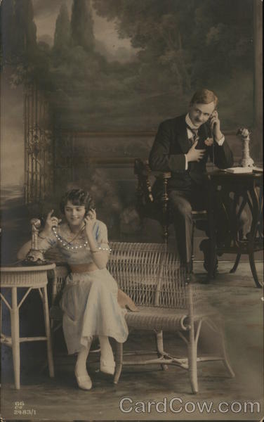 Man and Woman on Phone with each other Couples