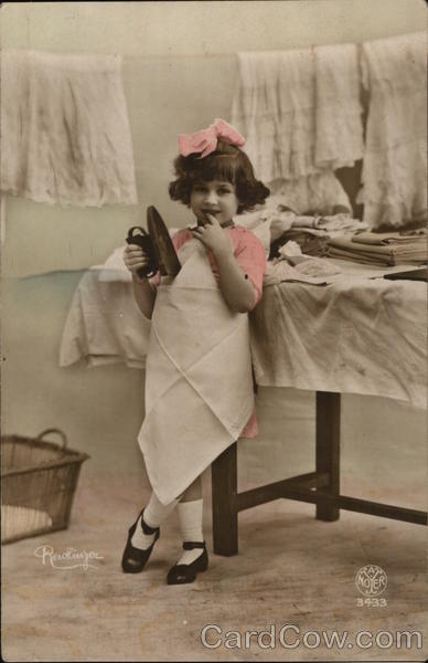 Pretty Little Girl Ironing with Pink Bow in Hair Girls