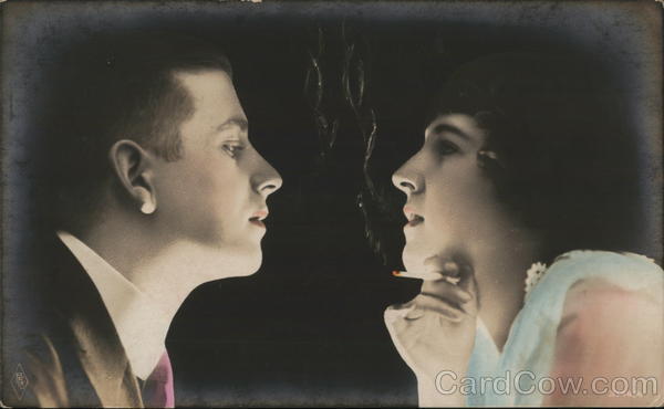 Close Up of Woman Holding Cigarette and Man Gazing at Each Other