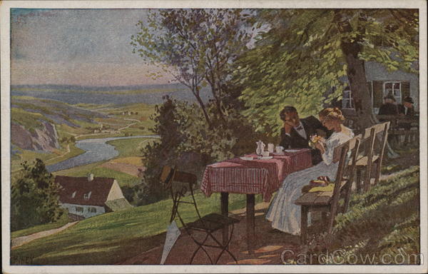 Man and Woman Seated at Picnic Table with Panoramic View