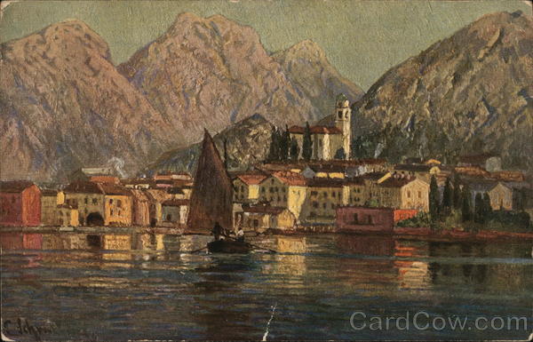 Waterfront Town with Colorful Structures Near Mountains