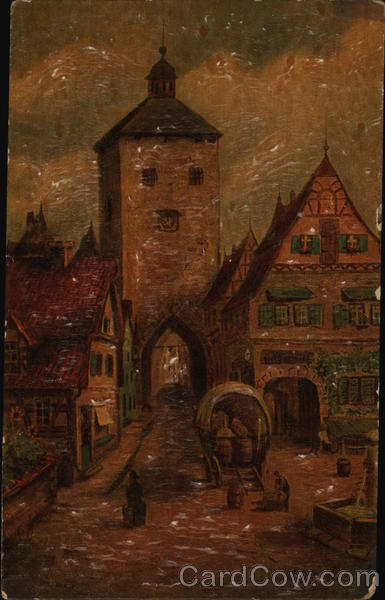 Narrow Town Street with Wagon Near Tower Entranceway Rothenburg Germany