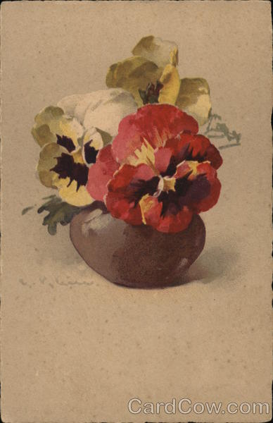 Orange and Yellow Pansies with Dark Centers in Vase