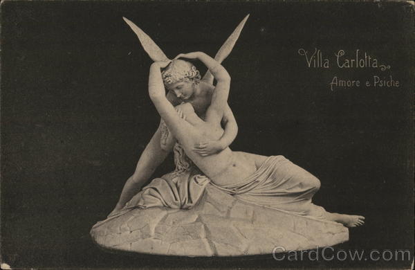 Sculpture of Male Angel With Arm Around Topless Woman