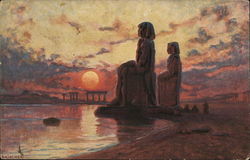Large Stone Figures Seated Near Ruins and Sunset Postcard