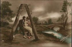 Letter "A" Man and Woman Perched on Piece of Wood Romantically Postcard