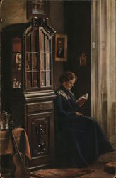 Woman in Dark Blue Dress Reading Book Near Cabinet Women Postcard Postcard
