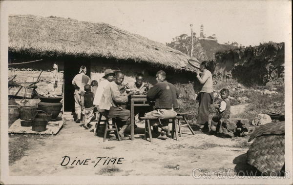 Dine-Time Outside Thatched Cottage China