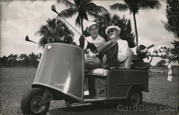 On a Tropical Golf Course in Cart with Clubs