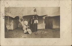 Family Outside Tents at Beach Family Outside Tents at Beach