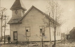 Church with Man Standing near Entrance Church with Man Standing near Entrance