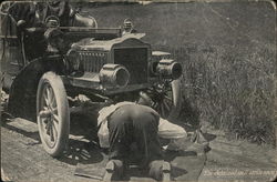 Man Kneeling in Road, Looking Under Car Man Kneeling in Road, Looking Under Car