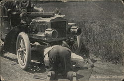 Man Kneeling in Road, Looking Under Car Cars Postcard Postcard