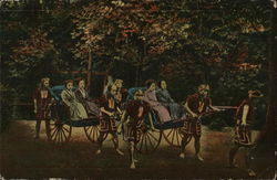 Two hand-pulled rickshaws carrying four upper class ladies. Two hand-pulled rickshaws carrying four upper class ladies.