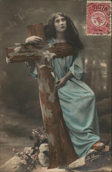 Woman with Long, Dark Hair Holding Large Cross Religious