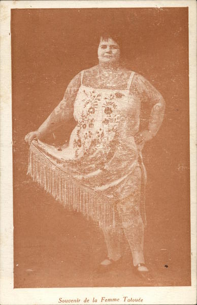 Tattooed Woman Holding Edge of Dress Circus