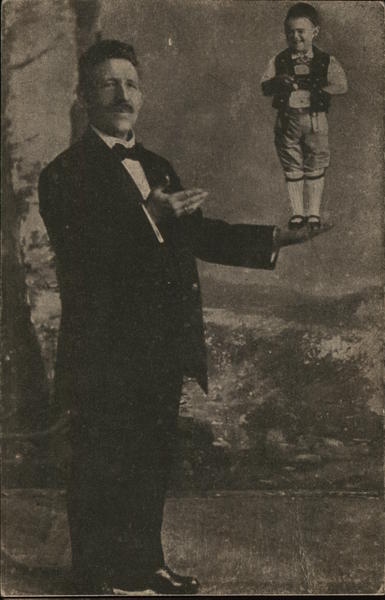 Man with Arm Extended, Holding Tiny Man Circus