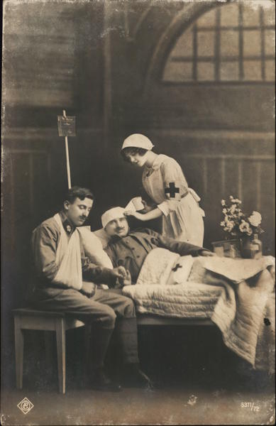 Nurse Assisting Two Injured Soldiers Military