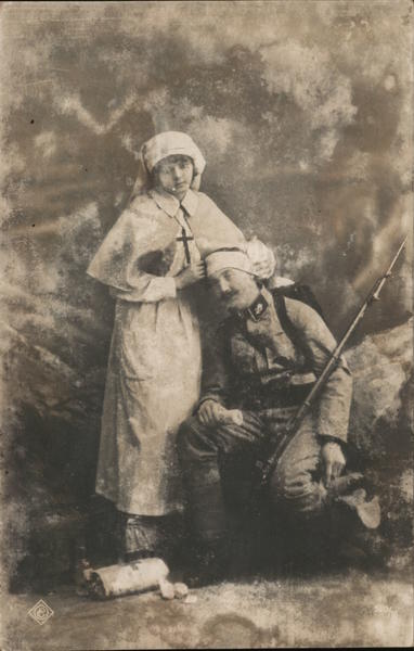 Nurse with wounded soldier Military