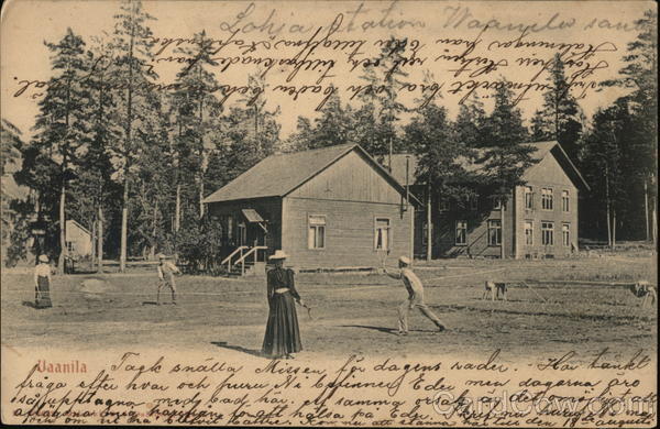 People Playing Tennis Near Trees, Houses Vaanila Finland